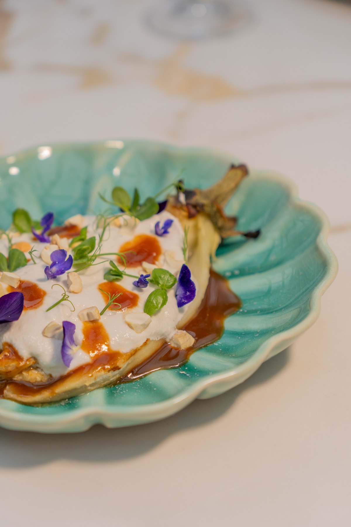 Fish on turquoise plate — El Jardín del Ritz, Madrid